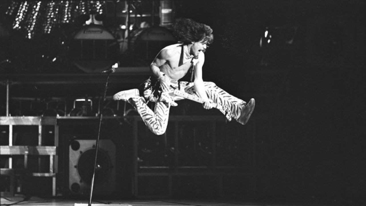 Los Angeles-based band Van Halen, guitarist Eddie Van Halen airborne during performance in Los Angeles, Calif., 1984.