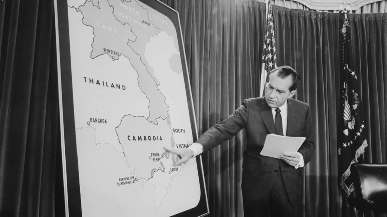Nixon points out Cambodia on a map