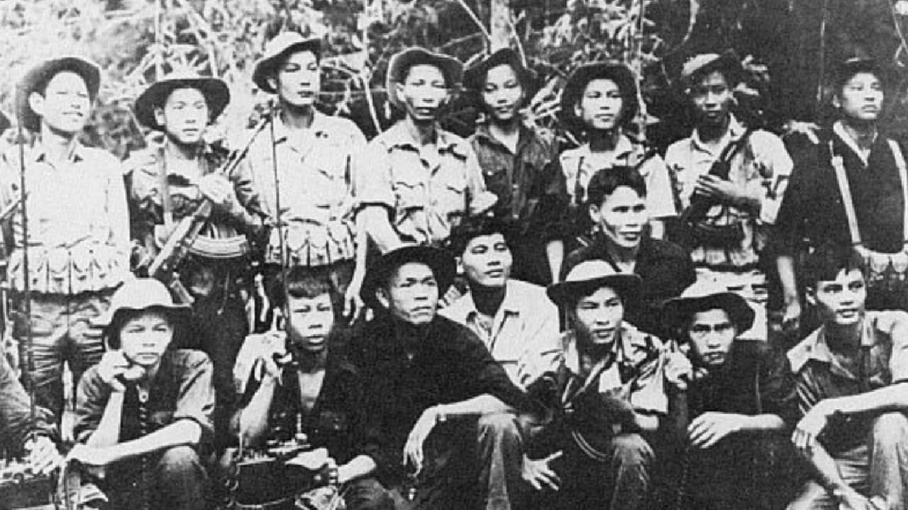 Viet Cong troops with captured US guns and radios