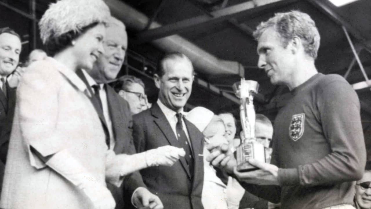 Queen Elizabeth II presenting the 1966 World Cup to Bobby Moore
