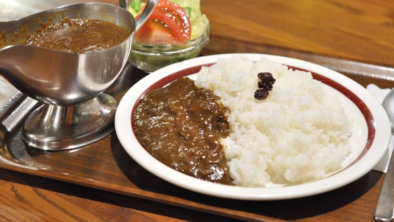 Beef curry and rice with raisins.